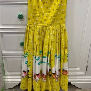 PUG Mary Blair trains dress in yellow